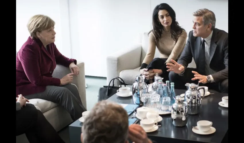 George Clooney, Amal Clooney y Angela Merkel
