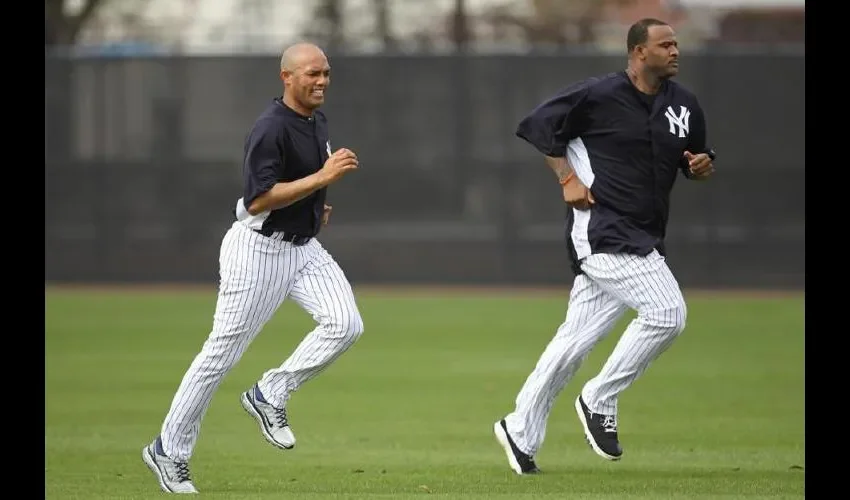 Mariano Rivera (izq.) y C.C. Sabathia ganaron la Serie Mundial de 2009. Tomada del New York Post 