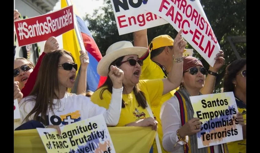 En varias ciudades colombianas y fuera del país hubo protestas contra el mandatario. EFE