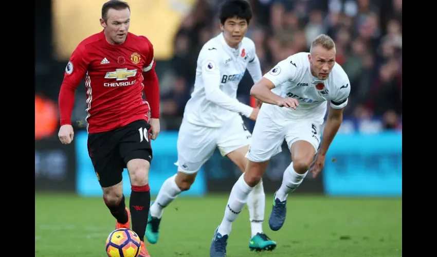 Acción de un juego de la Liga Premier./ Foto AP