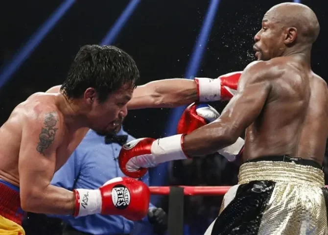   El estadounidense Floyd Mayweather Jr. (d) y el filipino Manny Pacquiao (i), en una imagen de archivo. EFE/Esther Lin  